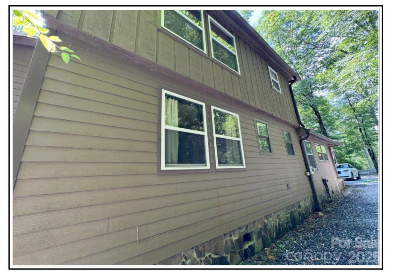 4700 West Buffalo Road Robbinsville, NC 28771 - Photo 12 of 25 a view of a house with a balcony