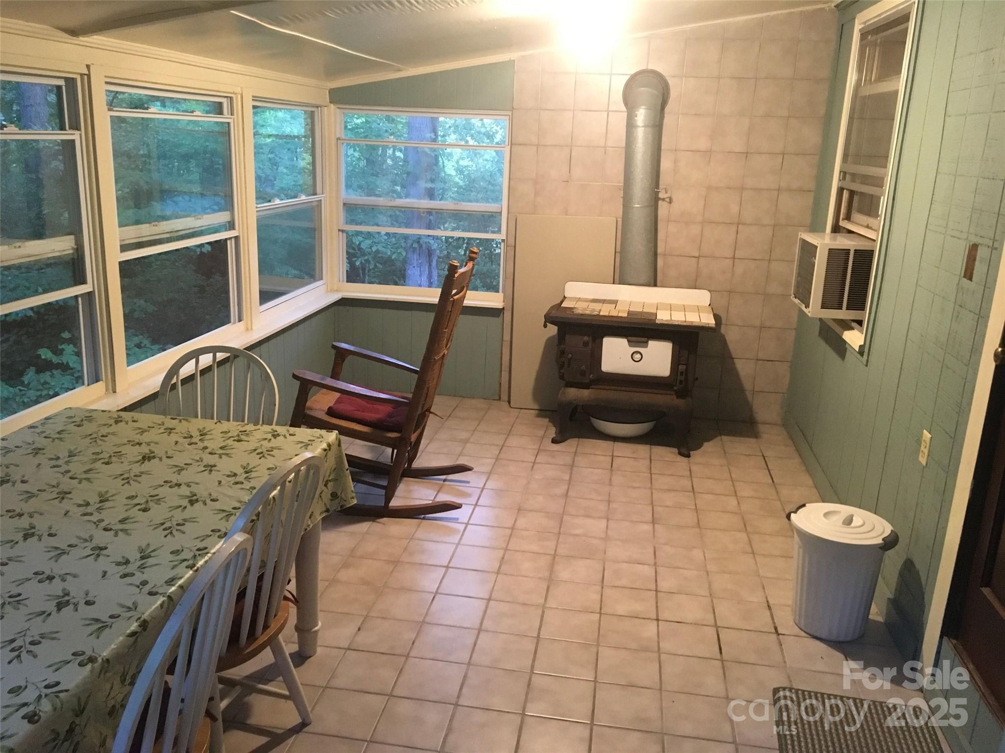 4700 West Buffalo Road Robbinsville, NC 28771 - Photo 7 of 25 a view of a patio with table and chairs
