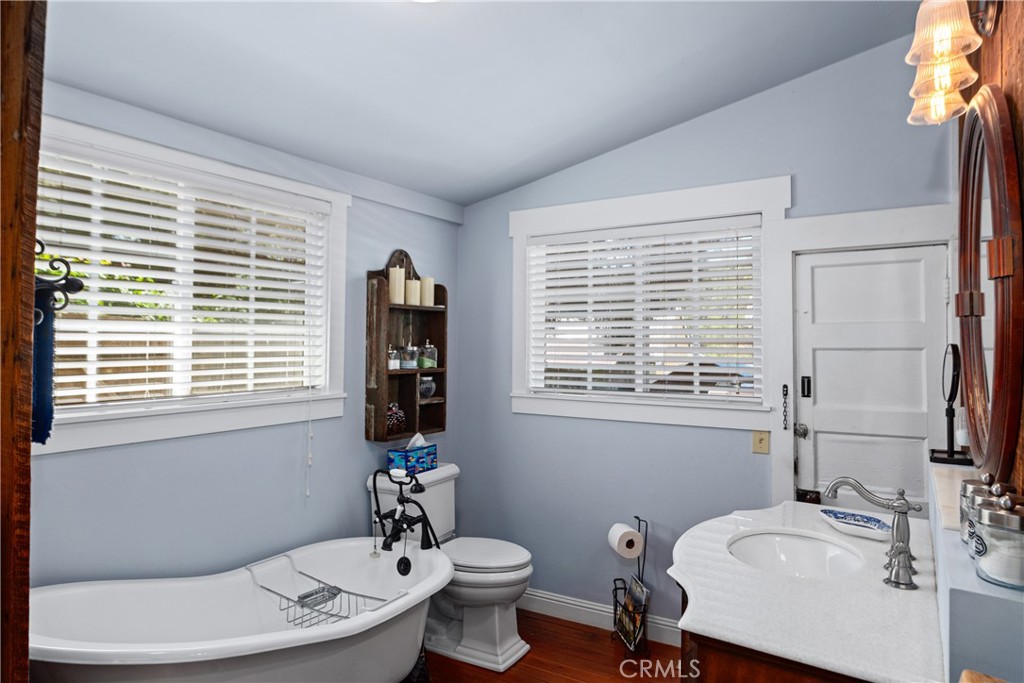 2013 3rd Street Julian, CA 92036 - Photo 15 of 32 a bathroom with a sink double vanity and a toilet