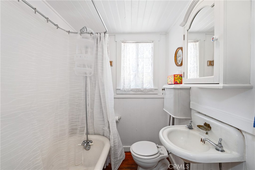 2013 3rd Street Julian, CA 92036 - Photo 17 of 32 a bathroom with a sink toilet a mirror and shower