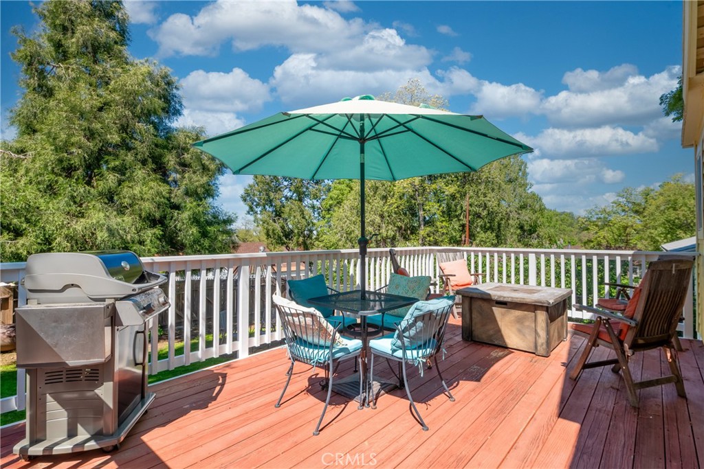 2013 3rd Street Julian, CA 92036 - Photo 21 of 32 a view of a deck with furniture and barbeque oven