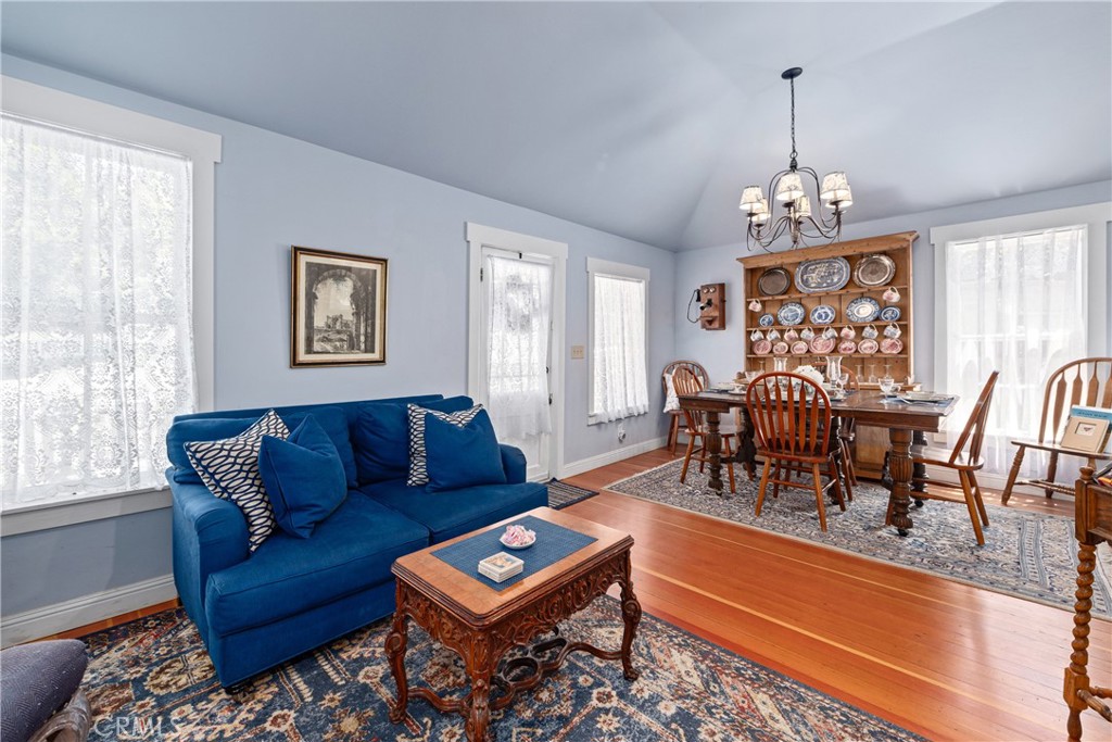 2013 3rd Street Julian, CA 92036 - Photo 8 of 32 a living room with furniture and a chandelier