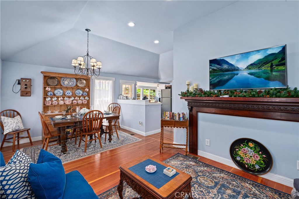 2013 3rd Street Julian, CA 92036 - Photo 9 of 32 a living room with furniture a rug and a chandelier