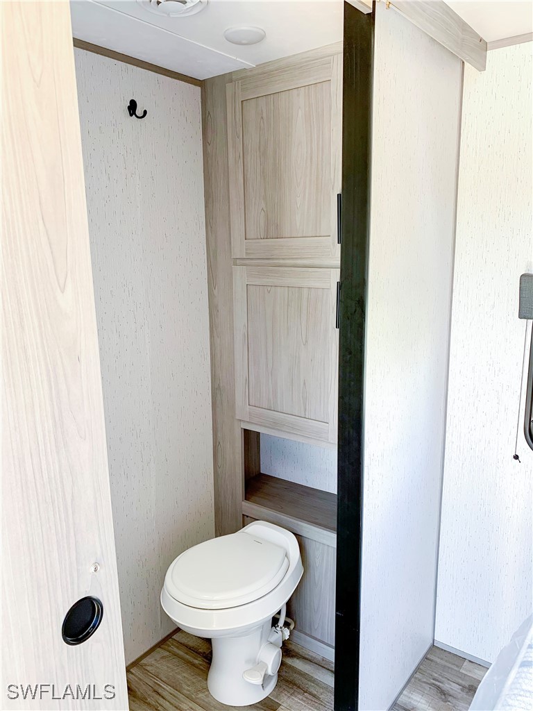 19681 Summerlin Road, Unit 23 Fort Myers, FL 33908 - Photo 16 of 24 a bathroom with a toilet and a shower