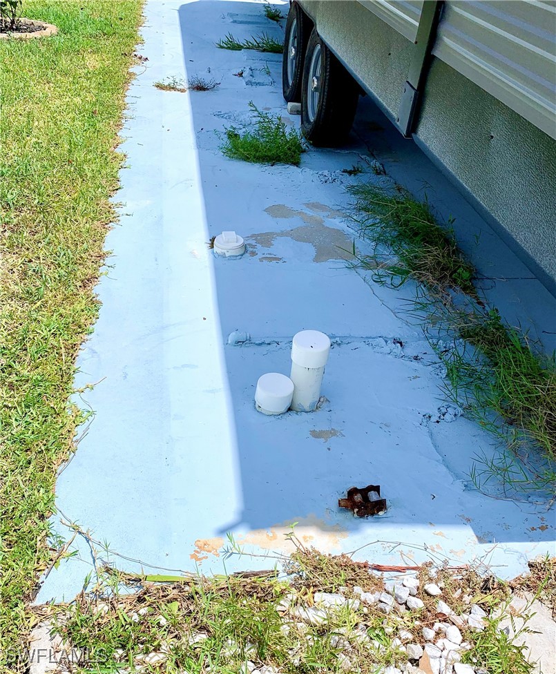 19681 Summerlin Road, Unit 23 Fort Myers, FL 33908 - Photo 22 of 24 a view of a backyard of the house