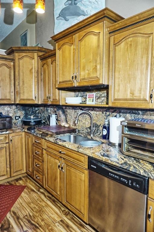 1873 Mazo Manor Road, Unit 5 Lutz, FL 33558 - Photo 17 of 41 a kitchen with stainless steel appliances granite countertop a sink a stove cabinets and granite countertops