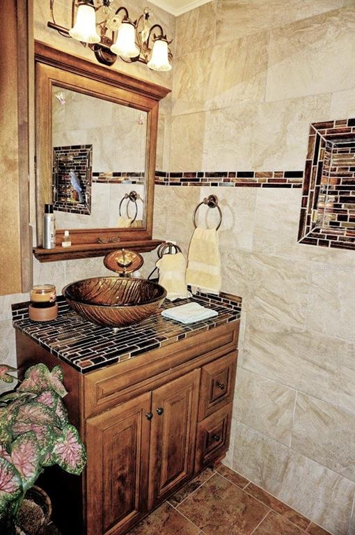 1873 Mazo Manor Road, Unit 5 Lutz, FL 33558 - Photo 31 of 41 a close view of a stove a sink and a window