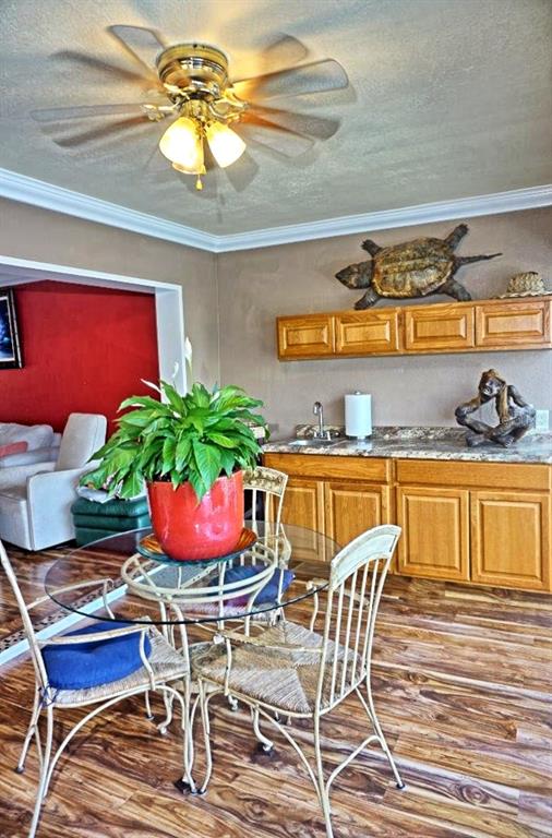 1873 Mazo Manor Road, Unit 5 Lutz, FL 33558 - Photo 10 of 41 a dining room filled with furniture and flower pot
