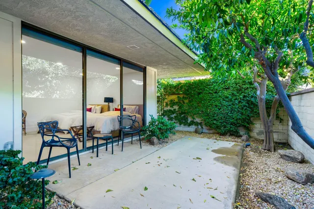 a view of an chairs and tables in the patio