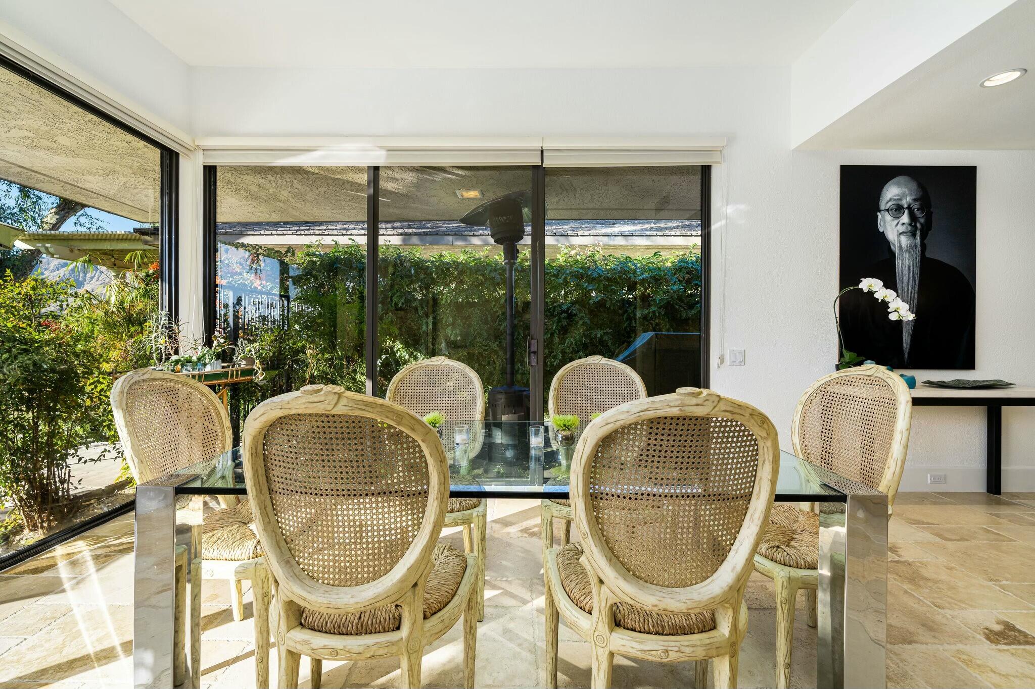 7 Princeton Drive Rancho Mirage, CA 92270 - Photo 7 of 39 a room with two sinks and a chandelier