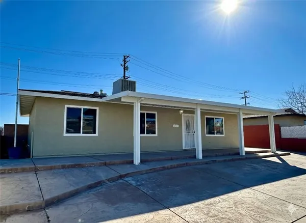 a front view of a house with yard