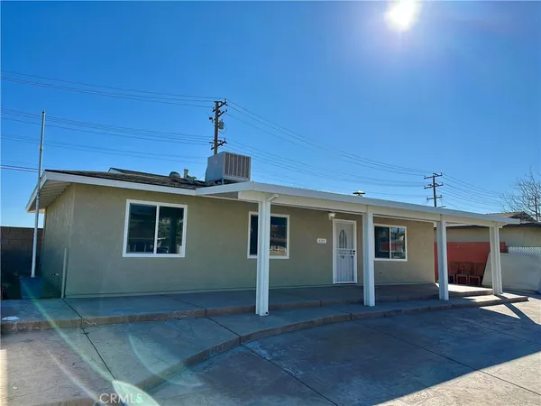 a view of a house with a garage