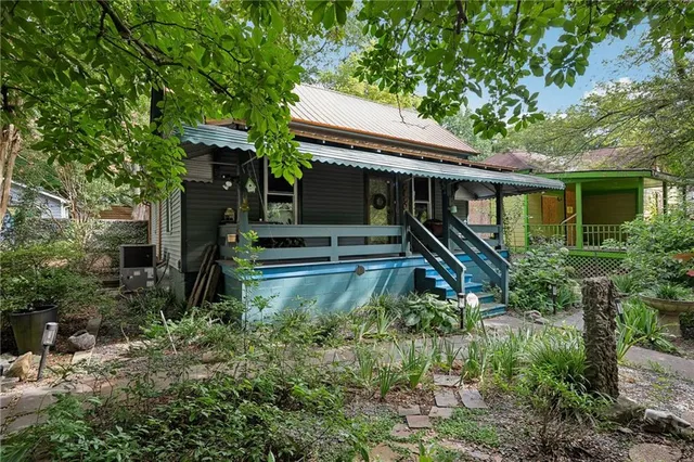 a house view with a backyard space