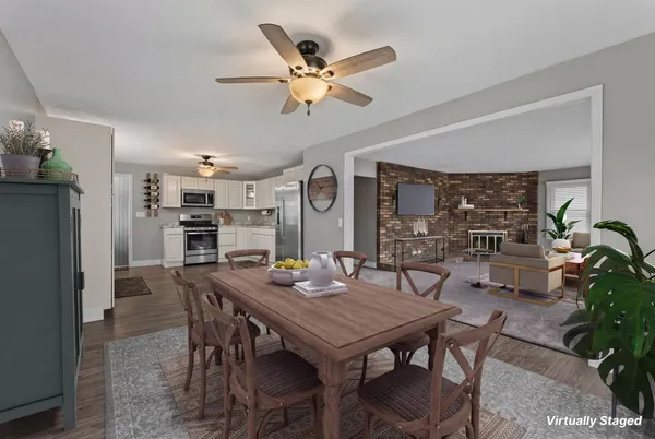 a view of a dining room with furniture
