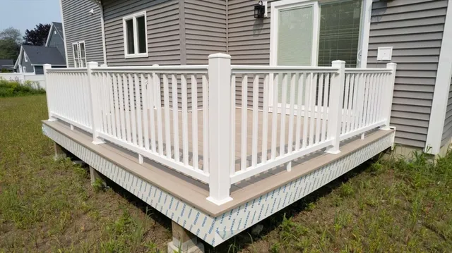 a view of a balcony with wooden floor