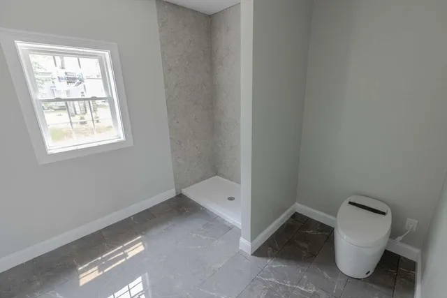a bathroom with a toilet