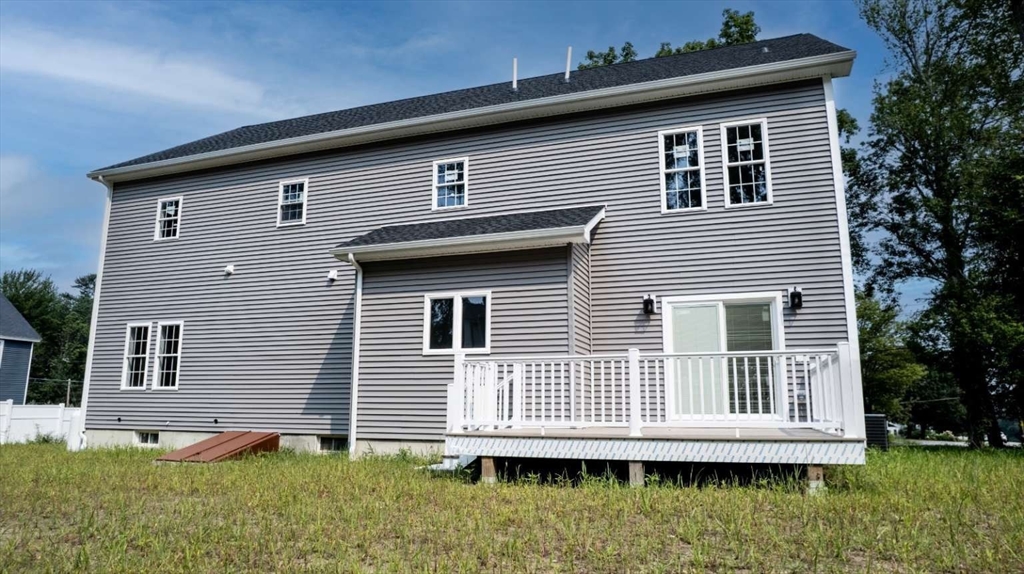 217 Prospect Street Auburn, MA 01501 - Photo 4 of 41 a front view of a house with a yard