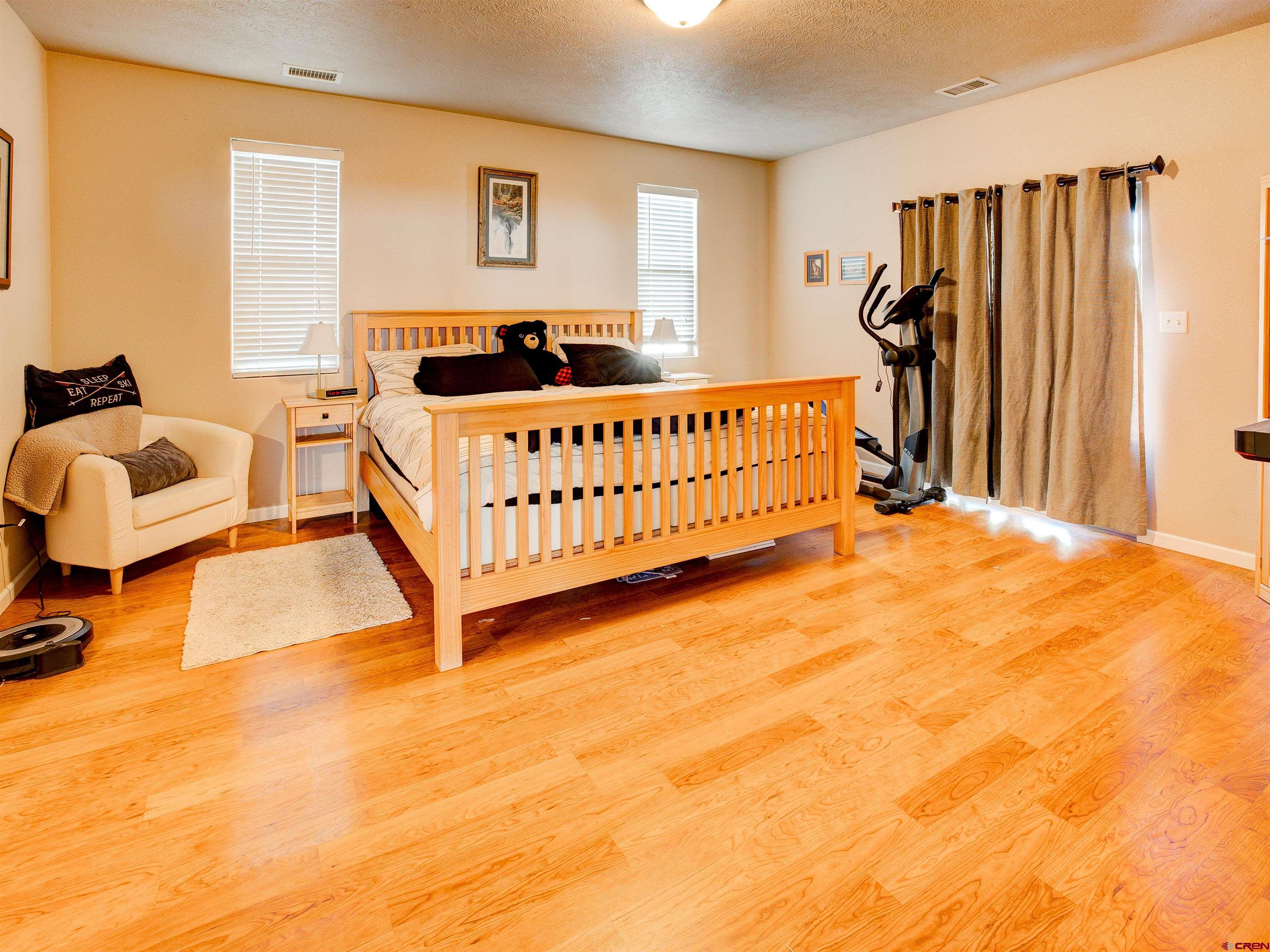 2942 F 1/4 Road Grand Junction, CO 81504 - Photo 15 of 32 a bedroom with furniture and a window