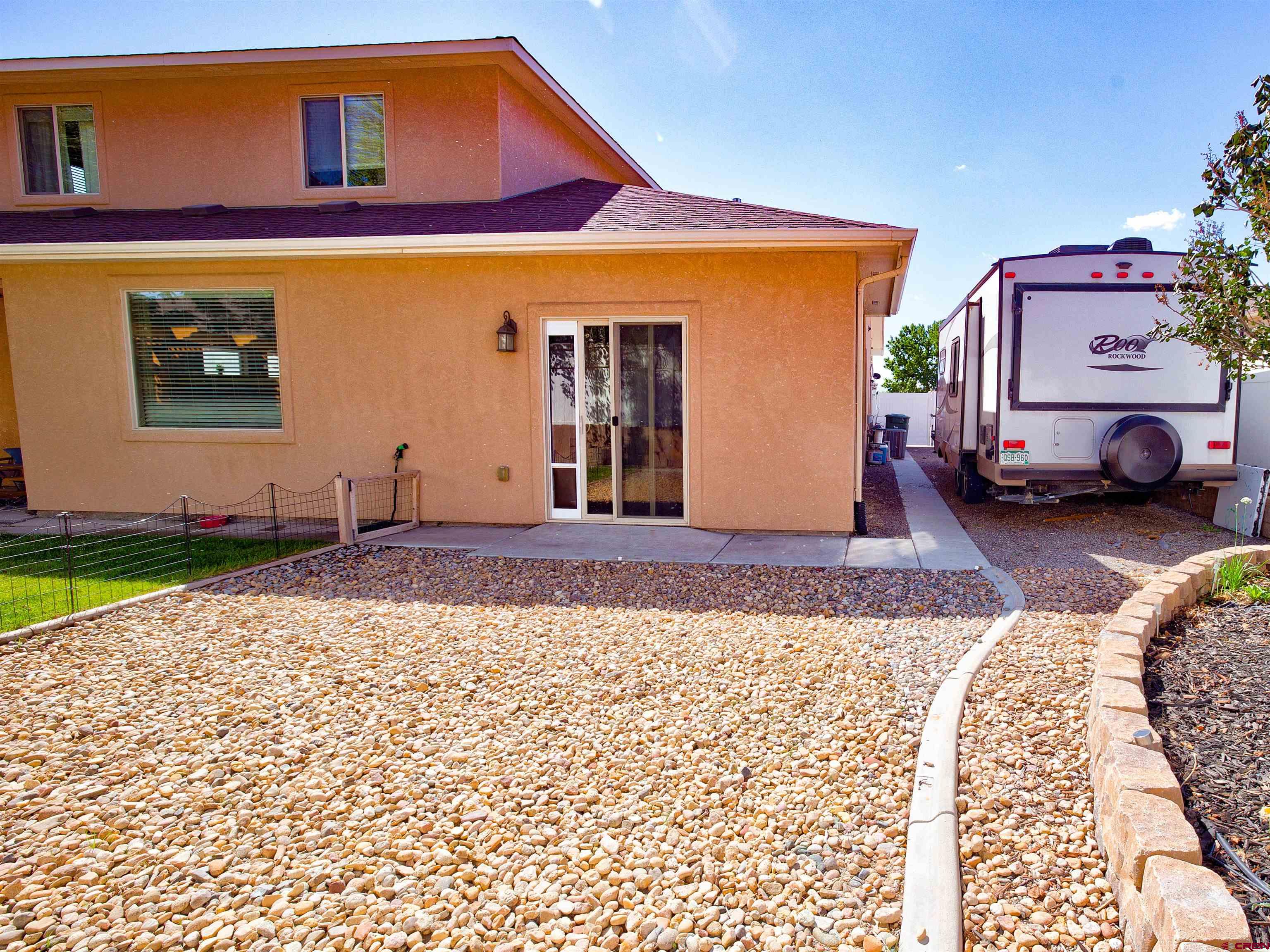 2942 F 1/4 Road Grand Junction, CO 81504 - Photo 30 of 32 a view of a car park in front of a house