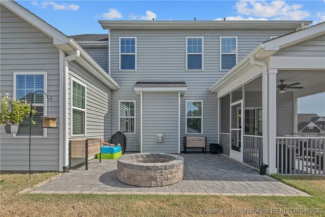 a backyard of house with seating space