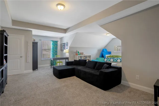 a living room with furniture and a couch