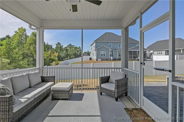 a view of a balcony with furniture