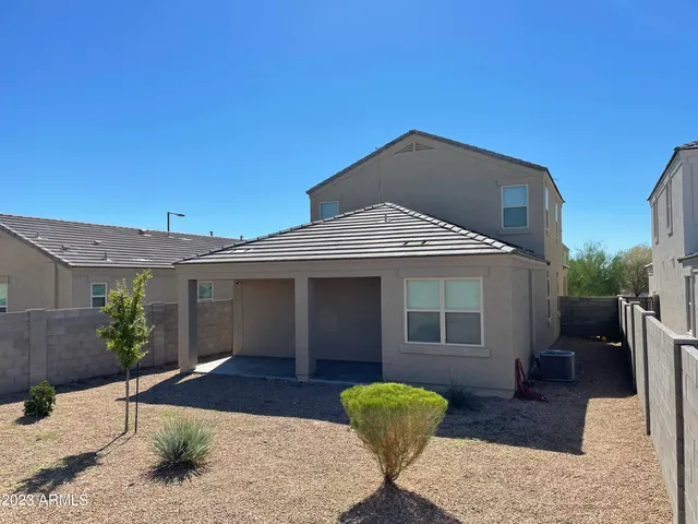 a view of a backyard with a garden