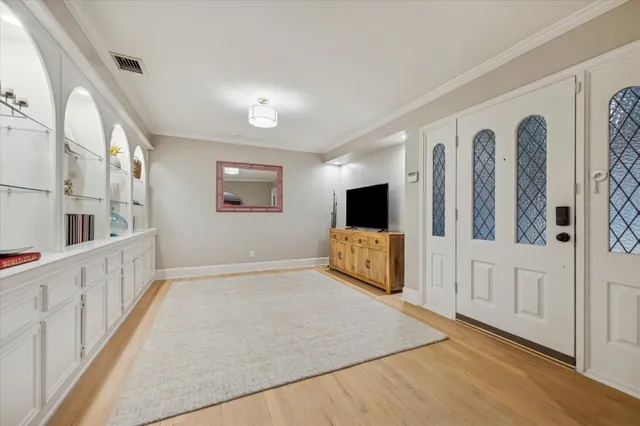 a view of livingroom with furniture and flat screen tv