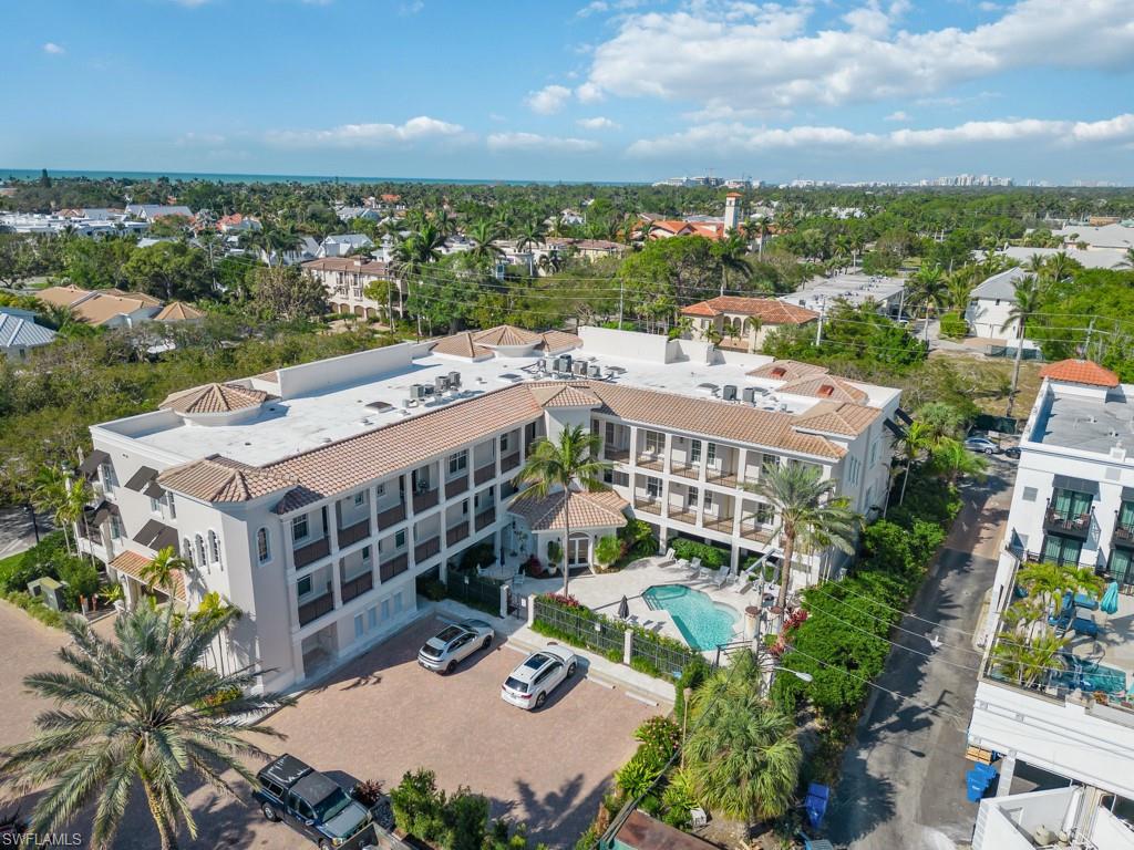 625 5th Avenue South, Unit PH302 Naples, FL 34102 - Photo 26 of 33 Bird's eye view of swimming pool.