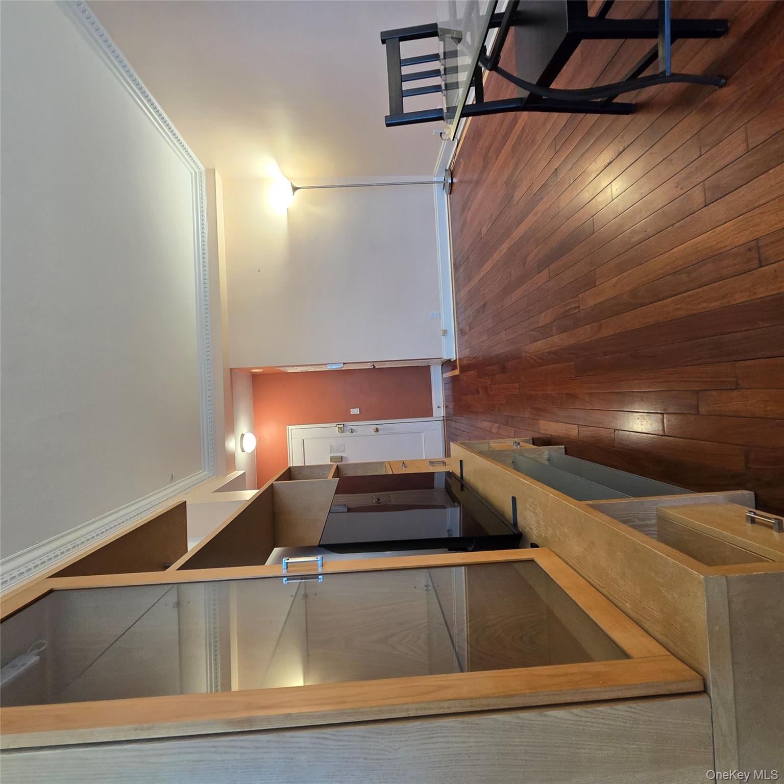 99-40 63rd Road, Unit 1O Queens, NY 11374 - Photo 3 of 14 a view of hallway with furniture and wooden floor