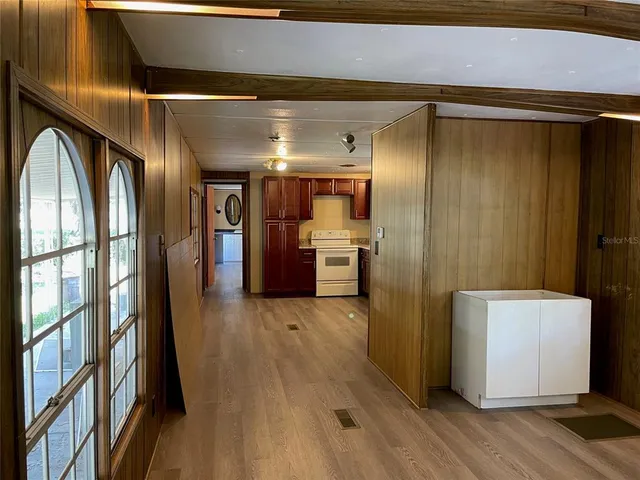 a kitchen with a refrigerator sink and stove