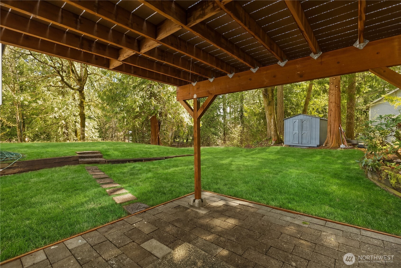 5205 59th Court Southwest Olympia, WA 98512 - Photo 35 of 39 a view of a backyard with garden