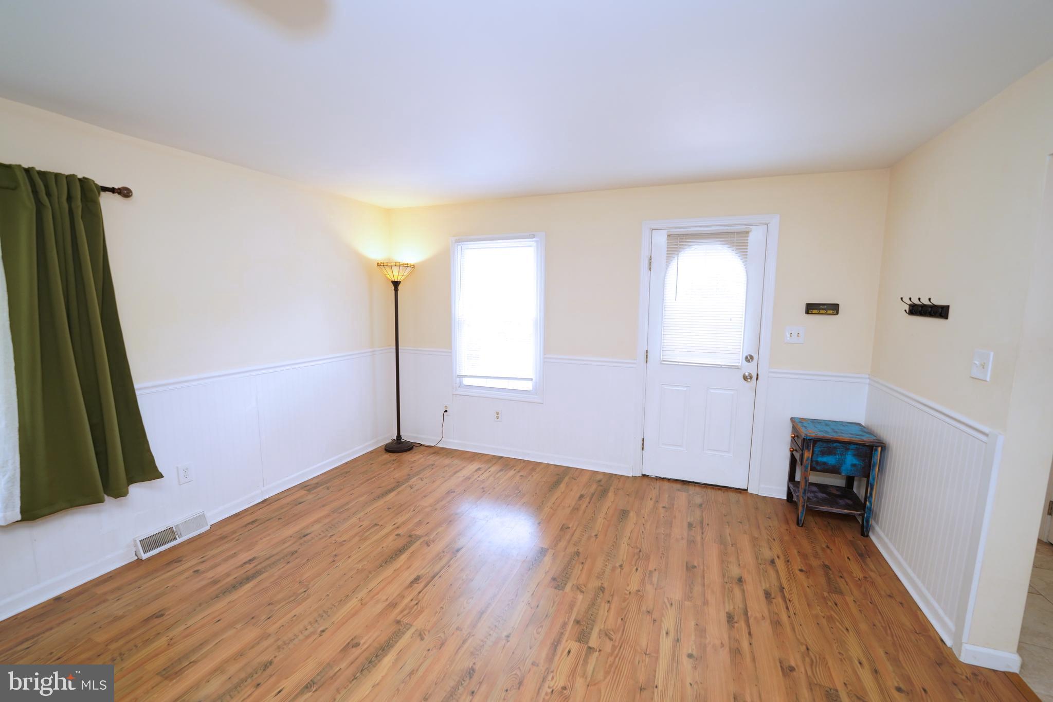 68 Collins Road Trenton, NJ 08619 - Photo 7 of 48 Driveway Entrance into LR/ Family Room Combo