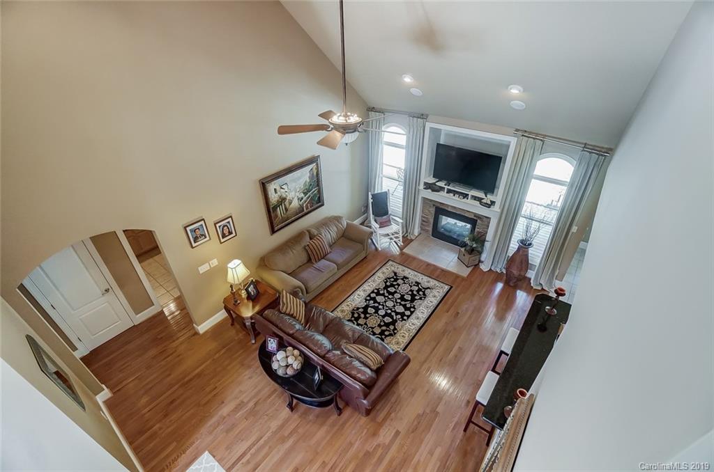 421 Greenbay Road Mooresville, NC 28117 - Photo 14 of 25 a view of living room with furniture and flat screen tv