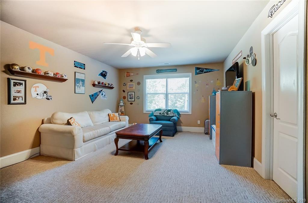 421 Greenbay Road Mooresville, NC 28117 - Photo 17 of 25 a living room with furniture and a window