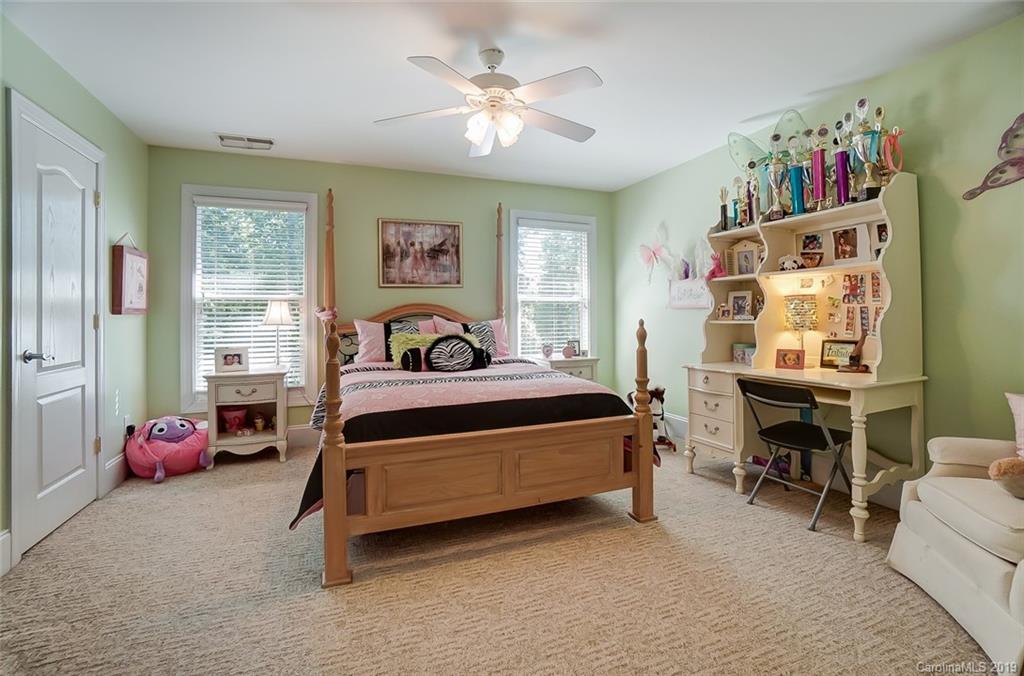 421 Greenbay Road Mooresville, NC 28117 - Photo 18 of 25 a bedroom with a bed and a window