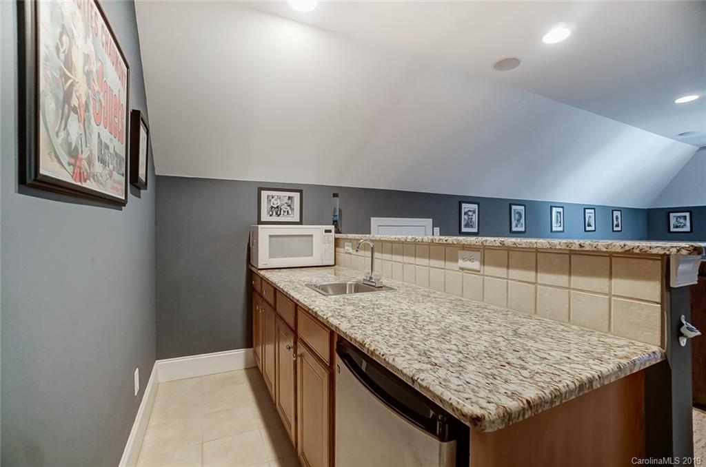 421 Greenbay Road Mooresville, NC 28117 - Photo 20 of 25 a kitchen with a counter top space and wooden floor