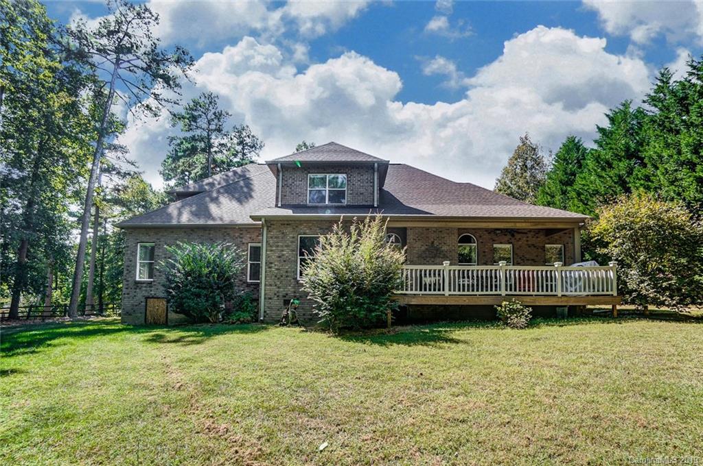 421 Greenbay Road Mooresville, NC 28117 - Photo 22 of 25 a front view of a house with a garden