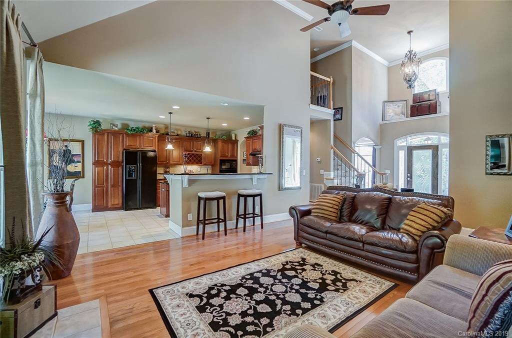 421 Greenbay Road Mooresville, NC 28117 - Photo 6 of 25 a living room with furniture and a rug