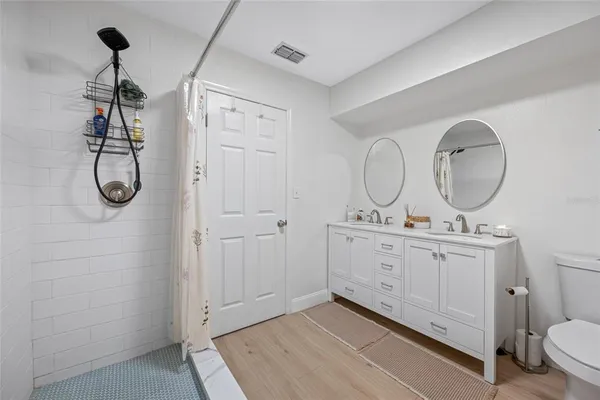 a patio with a patio table and chairs