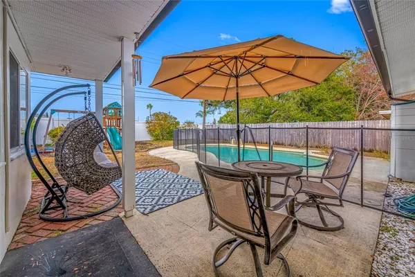 a view of a house with a swimming pool