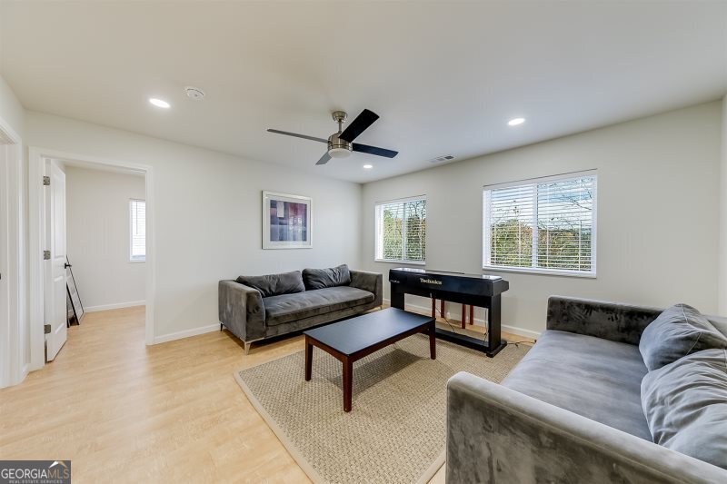 364 Rosen Strasse Helen, GA 30545 - Photo 20 of 45 a living room with furniture and a window