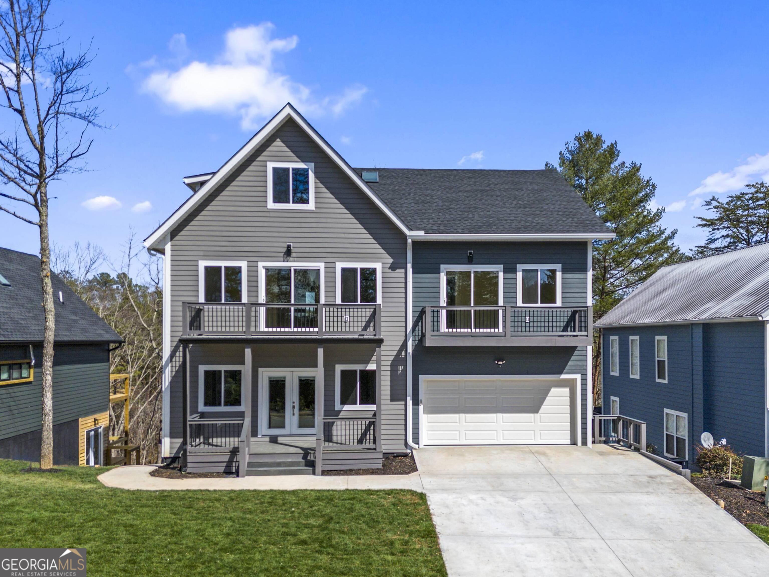 364 Rosen Strasse Helen, GA 30545 - Photo 2 of 45 a front view of a house with porch