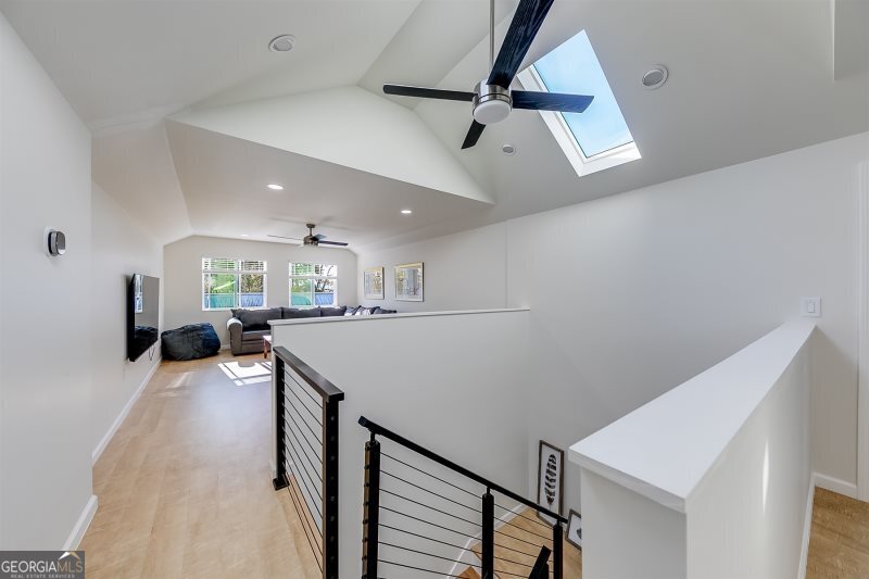 364 Rosen Strasse Helen, GA 30545 - Photo 21 of 45 a view of a room with wooden floor and staircase