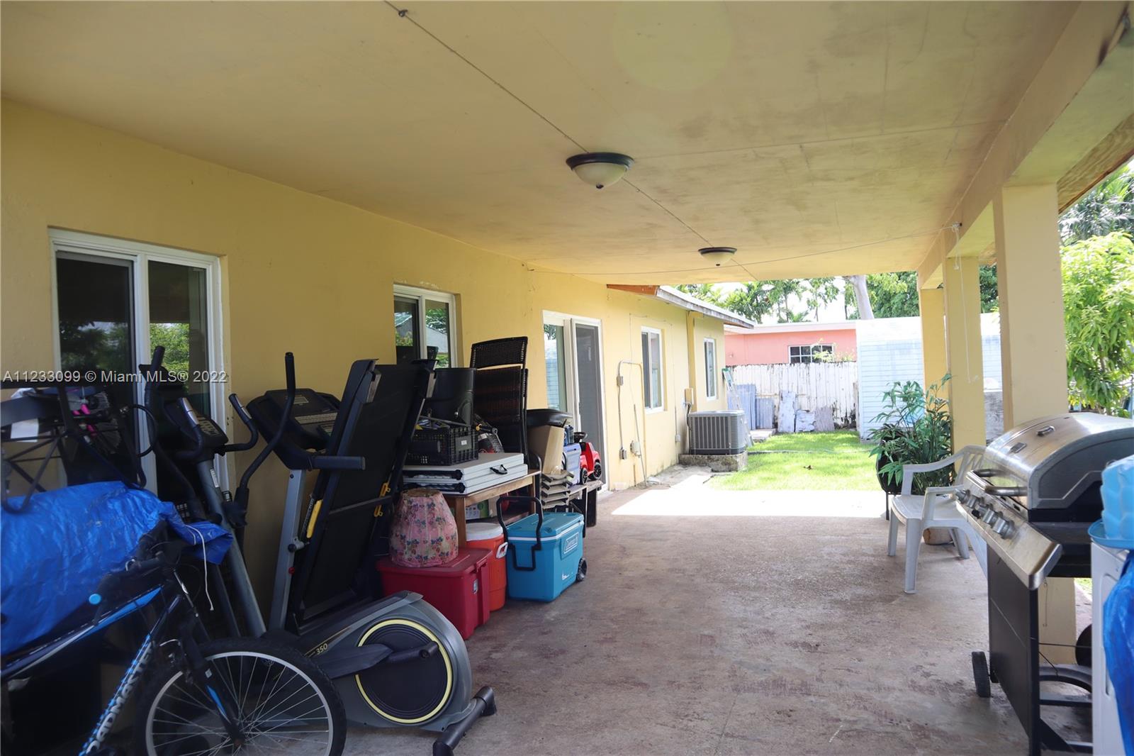 15261 Southwest 303rd Street Homestead, FL 33033 - Photo 15 of 23 a view of a room with gym equipment