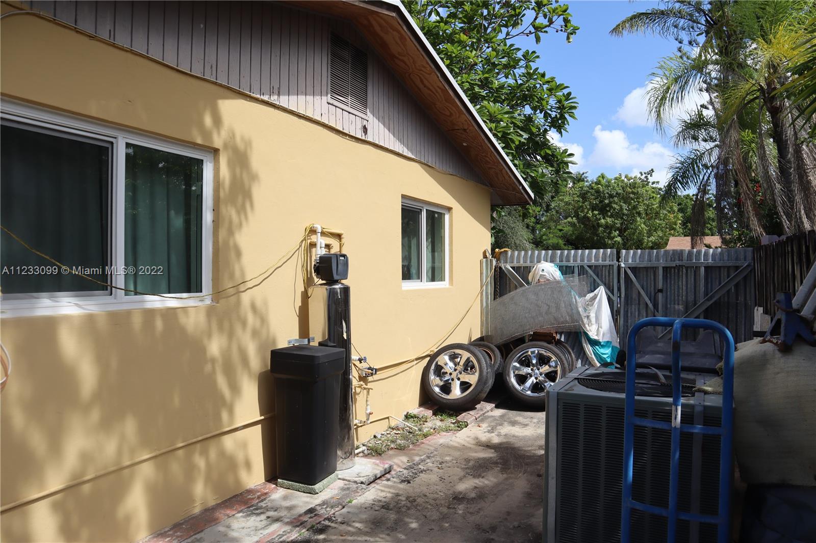 15261 Southwest 303rd Street Homestead, FL 33033 - Photo 18 of 23 a view of a garage