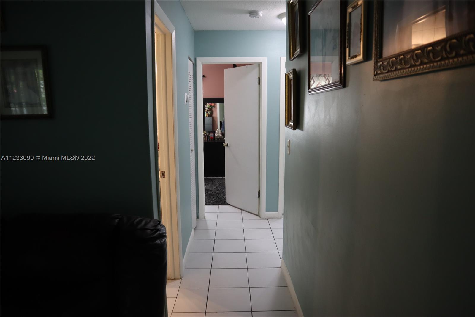 15261 Southwest 303rd Street Homestead, FL 33033 - Photo 5 of 23 a view of a hallway