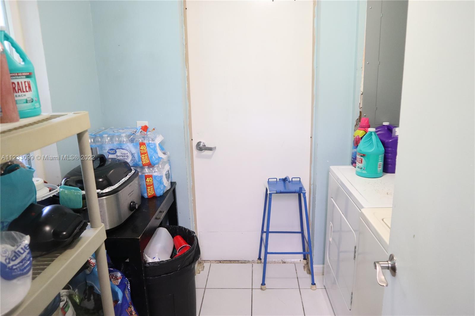 15261 Southwest 303rd Street Homestead, FL 33033 - Photo 8 of 23 a room with furniture and white walls