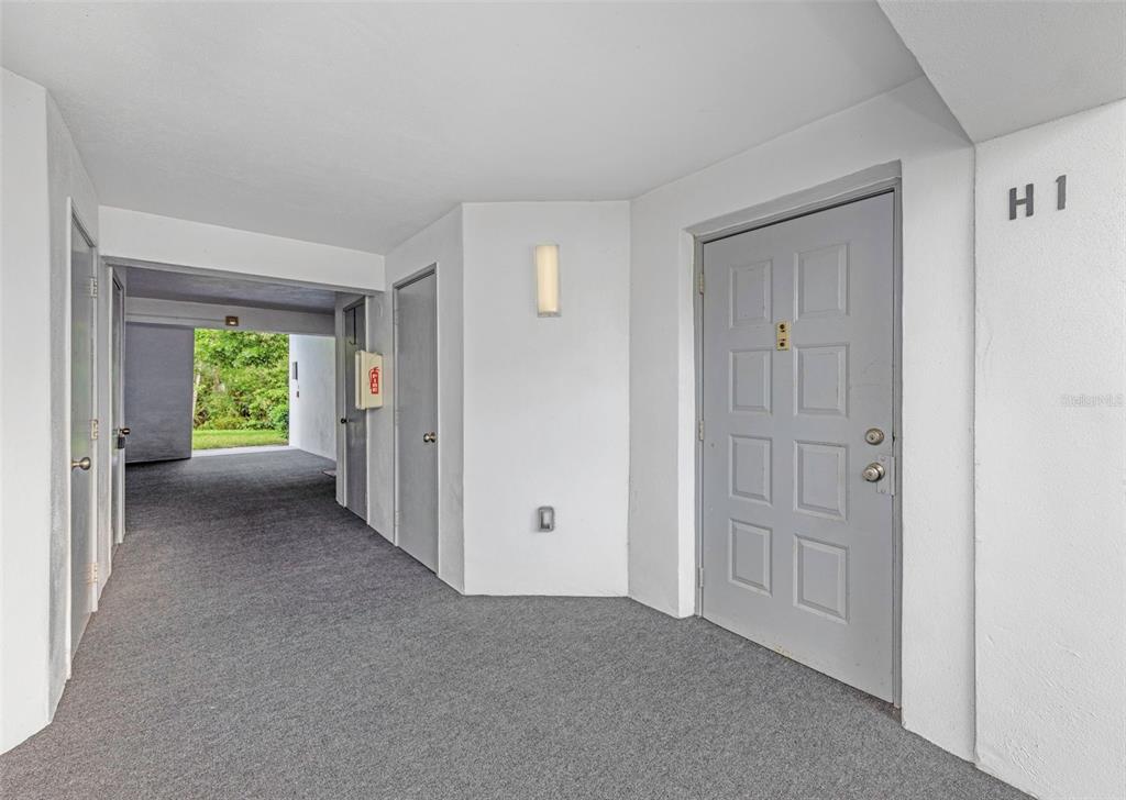 1308 Pine Ridge Circle East, Unit H1 Tarpon Springs, FL 34688 - Photo 33 of 50 a view of empty room with window