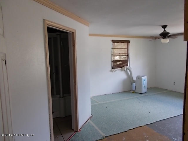 12424 Pulaski Road Jacksonville, FL 32218 - Photo 9 of 29 master bedroom